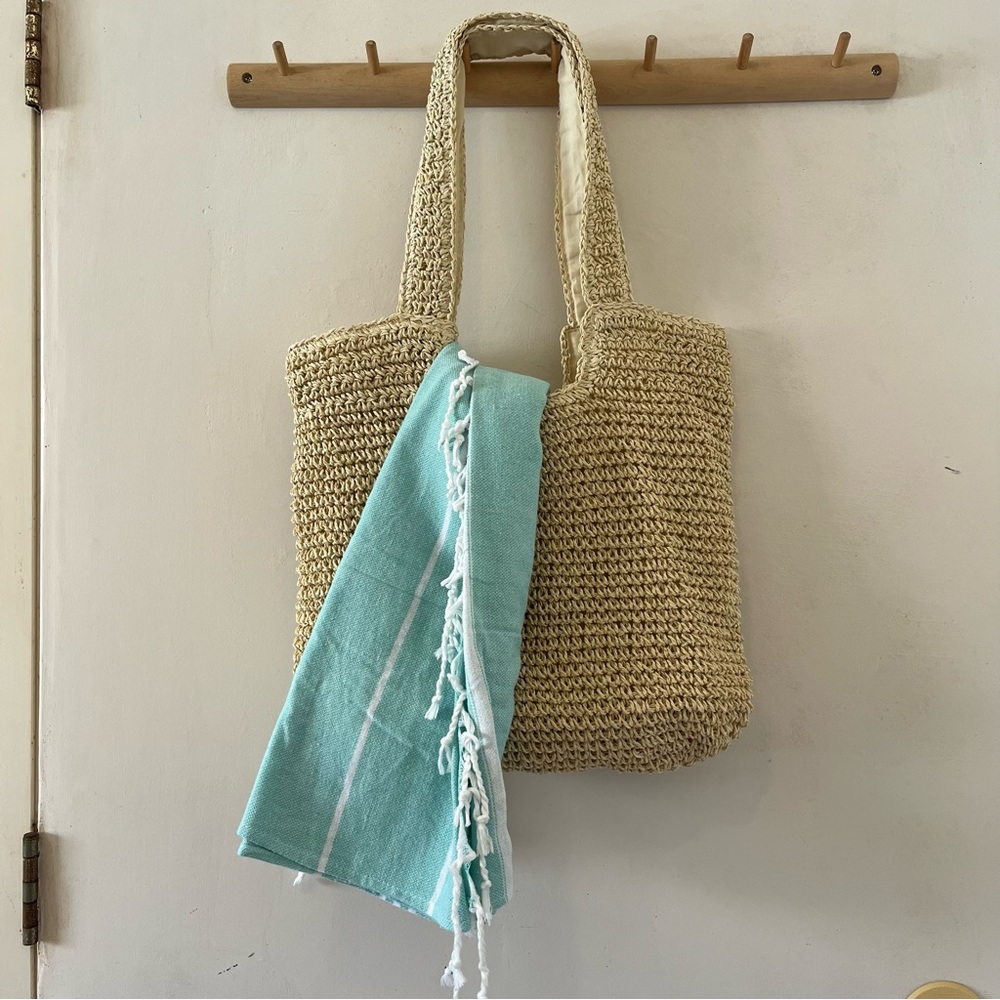 straw type beach bag with beach towel